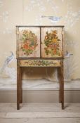 AN UNUSUAL GEORGE III SILVERED AND POLYCHROME PAINTED CABINET ON STAND, CIRCA 1790