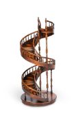 A LARGE WOODEN ARCHITECTURAL MODEL OF A SPIRAL STAIRCASE, IN THE MANNER OF MAITLAND SMITH