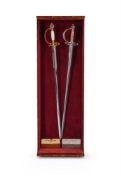 TWO LIMITED EDITION COMMEMORATIVE SWORDS