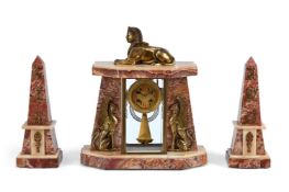 AN ART DECO 'EGYPTIAN REVIVAL' CLOCK GARNITURE: CIRCA 1925