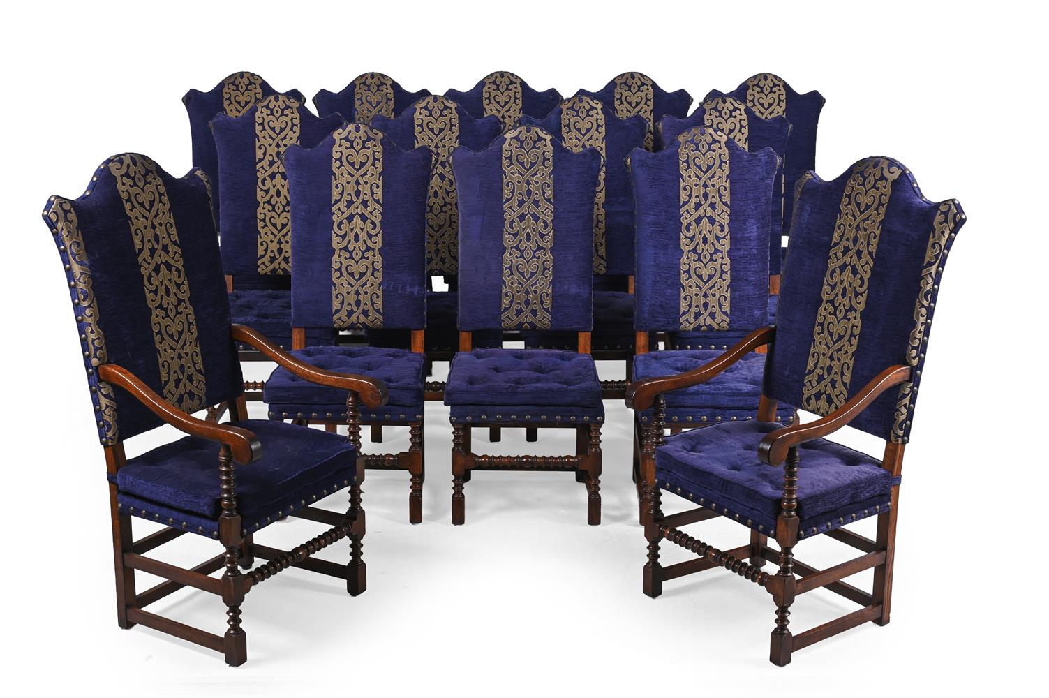 A SET OF FOURTEEN OAK AND UPHOLSTERED DINING CHAIRS TO INCLUDE TWO CARVERS, LATE 20TH CENTURY