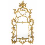 ‡ A GEORGE III GILTWOOD OVERMANTEL MIRROR, CIRCA 1760
