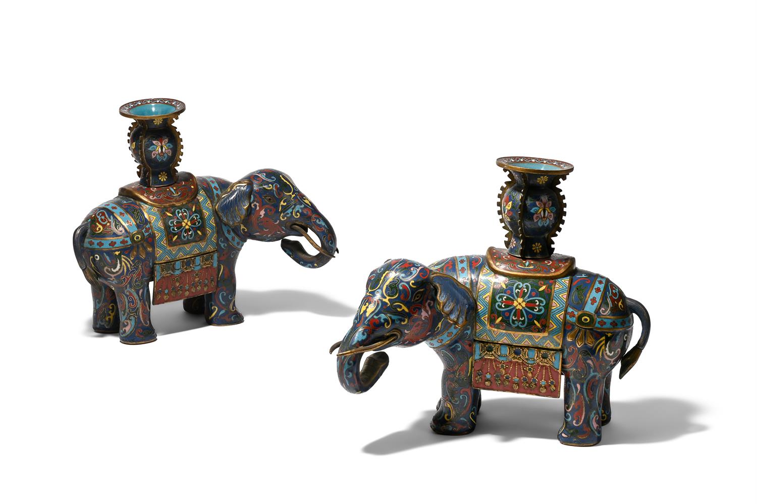 A PAIR OF CHAMPLEVE ENAMEL INLAID CANDLESTICKS, 19TH OR 20TH CENTURY