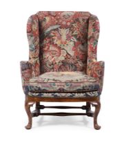 A GEORGE II 'RED WALNUT' AND GROS POINT UPHOLSTERED WING ARMCHAIR, MID 18TH CENTURY