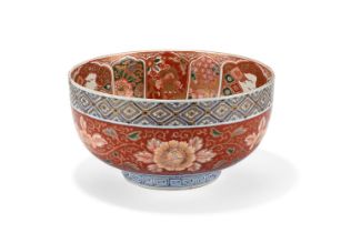 A JAPANESE RED DECORATED BOWL, 20TH CENTURY