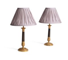 A PAIR OF BRONZE AND GILT CANDLESTICK LAMPS, MID 19TH CENTURY