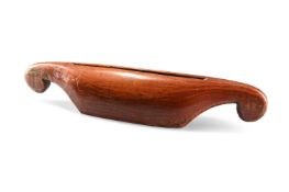 Y AN INDONESIAN CARVED HARDWOOD SLIT DRUM, 20TH CENTURY