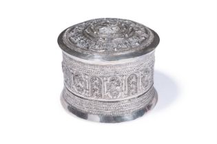 A BURMESE SILVER CIRCULAR BOX AND COVER, UNMARKED, CIRCA 1900