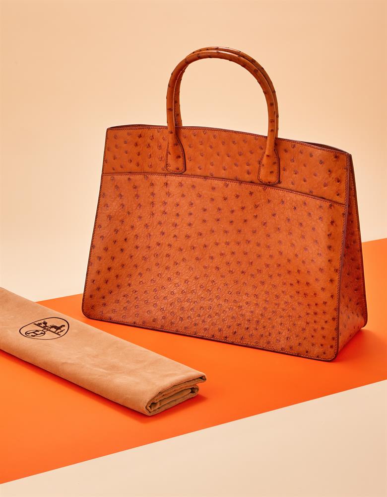 HERMES, WHITE BUS 40, A COGNAC OSTRICH HANDBAG