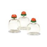 Y A group of three Chinese rock crystal snuff bottles