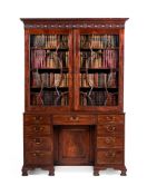 A GEORGE III MAHOGANY BOOKCASE CABINET, IN THE MANNER OF THOMAS CHIPPENDALE, CIRCA 1770