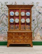 A GEORGE II WALNUT AND INLAID BOOKCASE, OF 'PEPYSIAN' DESIGN, CIRCA 1740