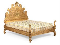 A GILTWOOD AND GESSO DECORATED BED, IN GEORGE I STYLE, EARLY 20TH CENTURY