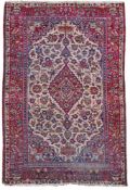 A KASHAN SILK RUG