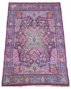 A KIRMAN CARPET
