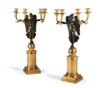 A PAIR OF REGENCY OR EMPIRE GILT AND PATINATED BRONZE LIGHT CANDELABRA, EARLY 19TH CENTURY