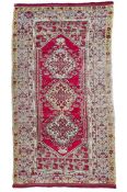 A GHIORDES CARPET, MID 19TH CENTURY