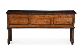 A GEORGE II YEW AND ELM DRESSER BASE, MID 18TH CENTURY