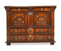 A CHARLES II WALNUT AND GEOMETRIC INLAID CHEST OF DRAWERS, CIRCA 1680