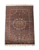 A FINE KASHAN PART SILK RUG