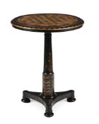 A REGENCY EBONISED, PARCEL GILT AND POLYCHROME PAINTED PEDESTAL GAMES TABLE, CIRCA 1815