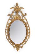 A GEORGE III CARVED GILTWOOD MIRROR, CIRCA 1780