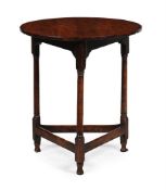 A YEW WOOD CRICKET TABLE, 18TH CENTURY
