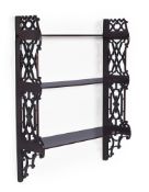 A SET OF GEORGE III MAHOGANY AND FRET CARVED HANGING SHELVES, CIRCA 1780