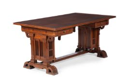 AN OAK PARTNER'S DESK OR LIBRARY TABLE, IN THE MANNER OF FRANK LLOYD WRIGHT, 20TH CENTURY