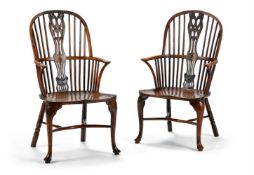 A MATCHED PAIR OF YEW AND WALNUT WINDSOR ARMCHAIRS, CIRCA 1800