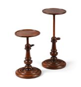 A PAIR OF GEORGE III MAHOGANY ADJUSTABLE CANDLESTANDS, SECOND HALF 18TH CENTURY