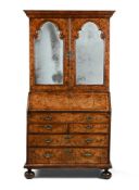 A GEORGE II BURR WALNUT, FIGURED WALNUT AND FEATHER BANDED BUREAU BOOKCASE, CIRCA 1740