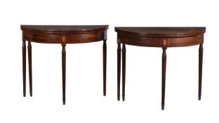 A PAIR OF GEORGE III MAHOGANY AND LINE INLAID DEMI-LUNE TEA TABLES, CIRCA 1790