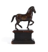 AFTER THE MODEL BY FRANCESCO FANELLI (1590-1653), A BRONZE MODEL OF A PACING HORSE, 17TH CENTURY