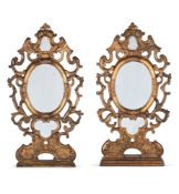 A MATCHED PAIR OF ITALIAN CARVED GILTWOOD MIRRORS, VENETIAN, 18TH CENTURY