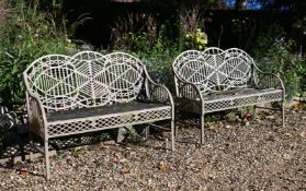 A PAIR OF CAST IRON GARDEN BENCHES, CIRCA 1960