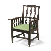 AN UNUSUAL GEORGE III MAHOGANY ARMCHAIR, IN THE MANNER OF ROBER MANWARING, CIRCA 1780