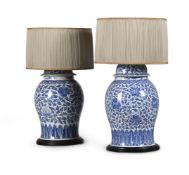 A LARGE PAIR OF CHINESE BLUE AND WHITE PORCELAIN BALUSTER VASES AND COVERS, 19TH CENTURY
