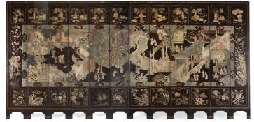 Y A LARGE CHINESE COROMANDEL LACQUER TWELVE FOLD SCREEN, MID 19TH CENTURY
