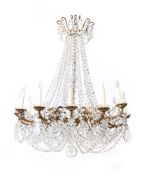 A FRENCH GILT METAL FRAMED TWELVE LIGHT CHANDELIER, LATE 19TH CENTURY