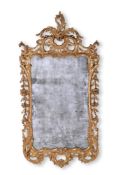 A GEORGE III CARVED GILTWOOD MIRROR, CIRCA 1780