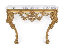 A GEORGE II CARVED GILTWOOD CONSOLE TABLE, AFTER DESIGNS BY MATTHIAS LOCK, CIRCA 1750