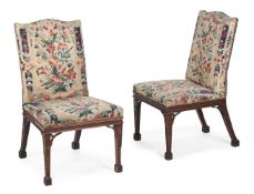 A PAIR OF GEORGE III CARVED MAHOGANY AND NEEDLEWORK UPHOLSTERED SIDE CHAIRS, CIRCA 1780