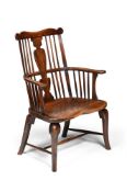 A GEORGE III FRUITWOOD, WALNUT AND ELM COMB BACK WINDSOR ARMCHAIR, CIRCA 1800