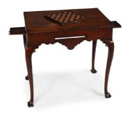 AN UNUSUAL GEORGE II MAHOGANY GAMES TABLE, CIRCA 1740-1750