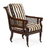 A REGENCY MAHOGANY LIBRARY BERGERE ARMCHAIR, ATTRIBUTED TO GILLOWS, CIRCA 1815