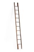 A MAHOGANY AND BRASS METAMORPHIC POLE LADDER, LATE 19TH OR EARLY 20TH CENTURY
