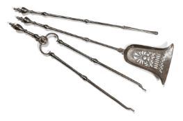 A SET OF THREE GEORGE III POLISHED STEEL FIRE TOOLS, LATE 18TH CENTURY