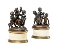 AFTER JACQUES SARAZIN, A PAIR OF CENTURY BRONZE BACCHIC INFANT GROUPS