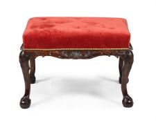 A CARVED MAHOGANY STOOL, IN GEORGE II STYLE, 19TH CENTURY